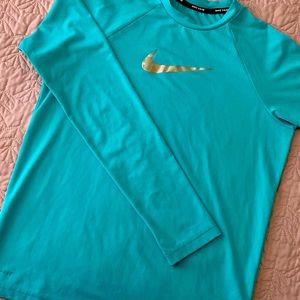 Swim shirt unisex color blue , like new